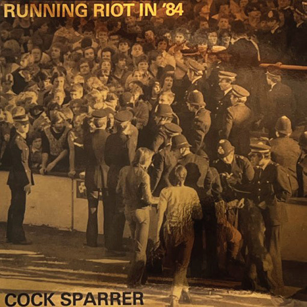 COCK SPARRER RUNNING RIOT IN ‘84 (BLACK ICE/WHITE SPLATTER VINYL) VINYL LP