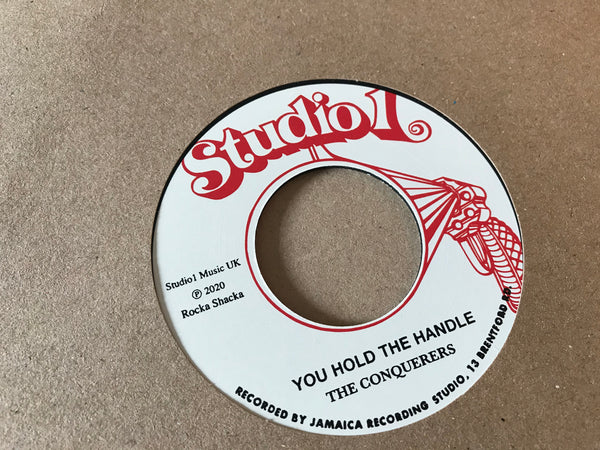 The Conquerors - You Hold The Handle / Freedom Singers - Black Is Black 7" RSCS7010
